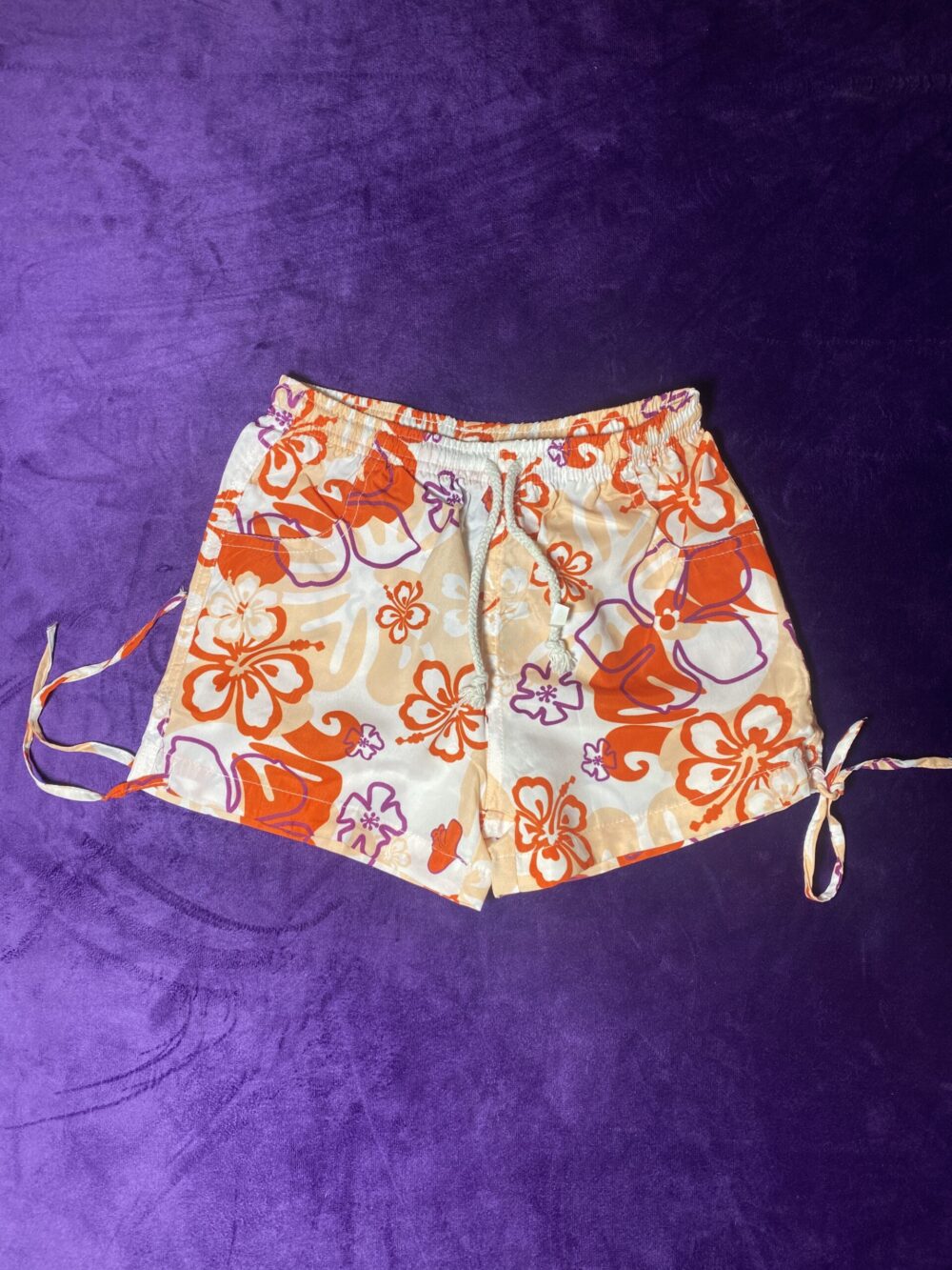 ORANGE/PEACH PURPLE FLORA SWIM SHORT