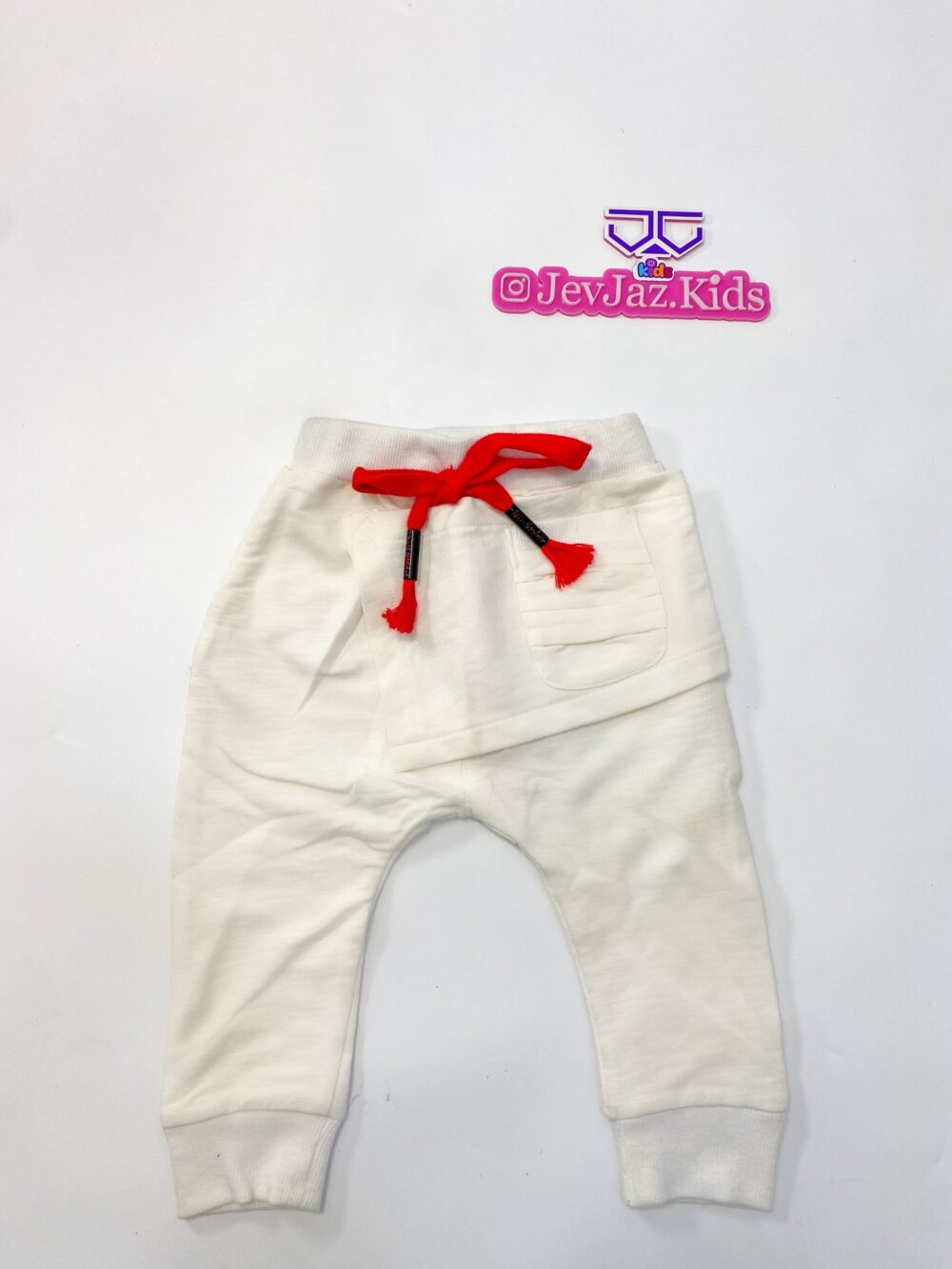 WHITE JOGGERS WITH RED ROPE
