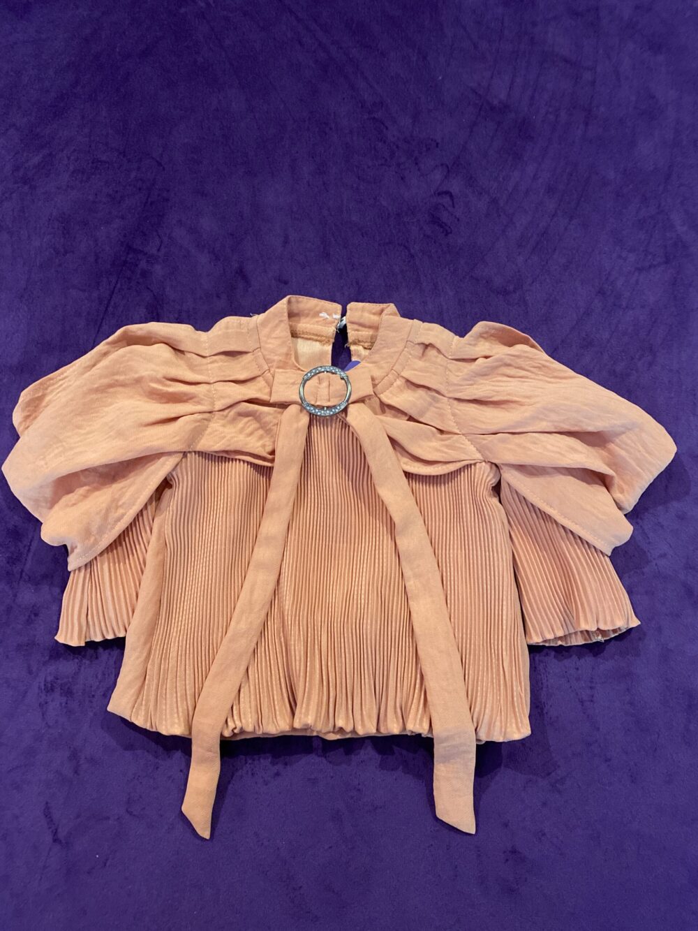 CORAL PLEATED TOP WITH BOW